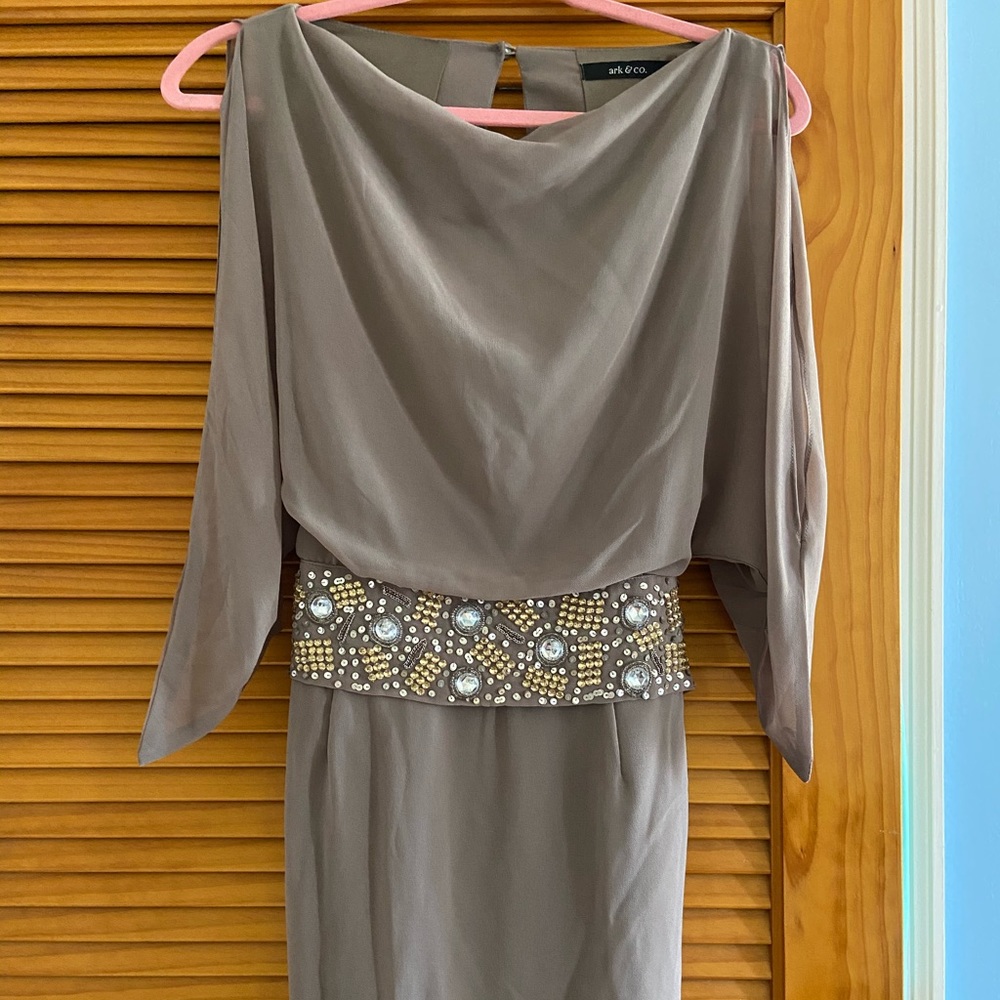 Short beige dress with open back